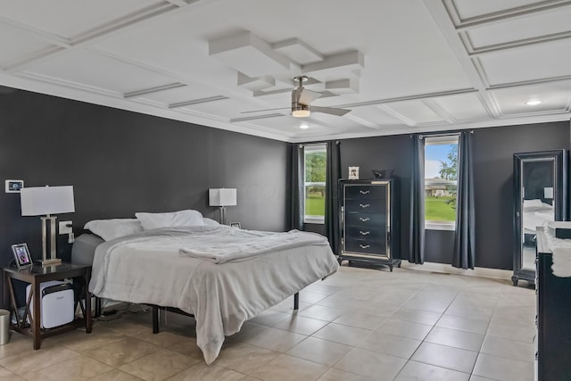 bedroom featuring multiple windows, ceiling fan, and light tile patterned floors