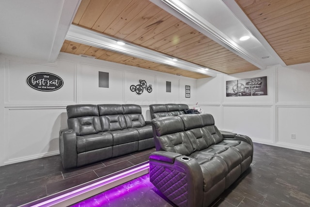 cinema with dark hardwood / wood-style floors and wooden ceiling