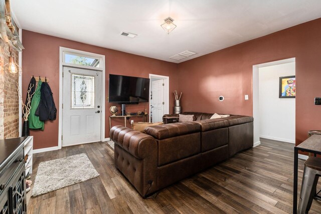 living room with dark wood-type flooring