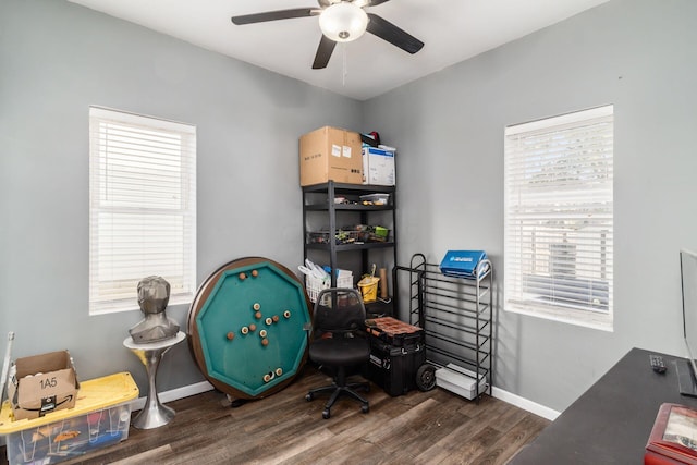 home office featuring dark hardwood / wood-style flooring and ceiling fan