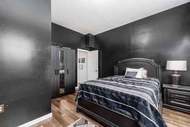 bedroom featuring light hardwood / wood-style flooring