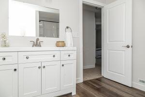 bathroom featuring hardwood / wood-style floors and vanity