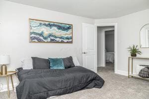 bedroom featuring carpet flooring