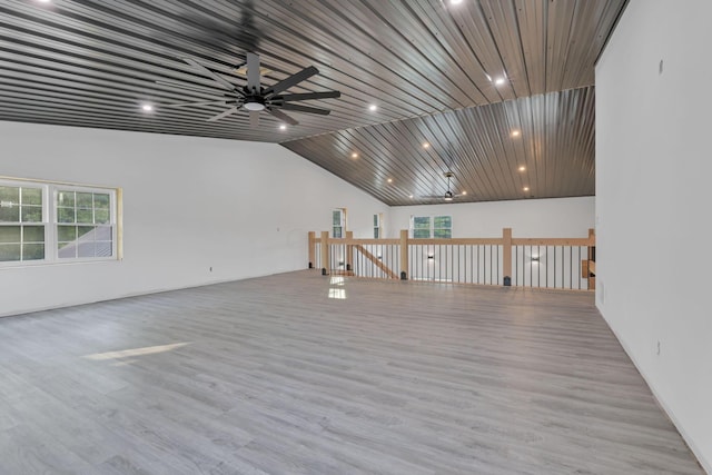 unfurnished room featuring ceiling fan, light hardwood / wood-style floors, and plenty of natural light