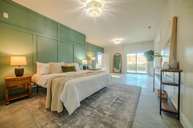 bedroom with an inviting chandelier