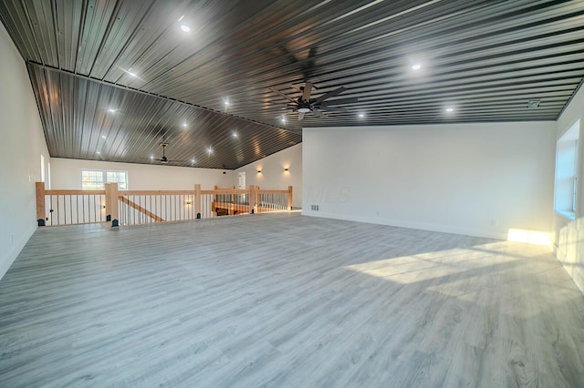 interior space featuring ceiling fan and wood-type flooring