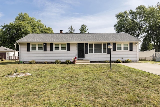 ranch-style house featuring a front lawn