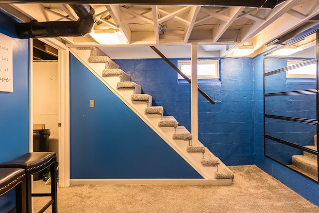 basement with carpet flooring