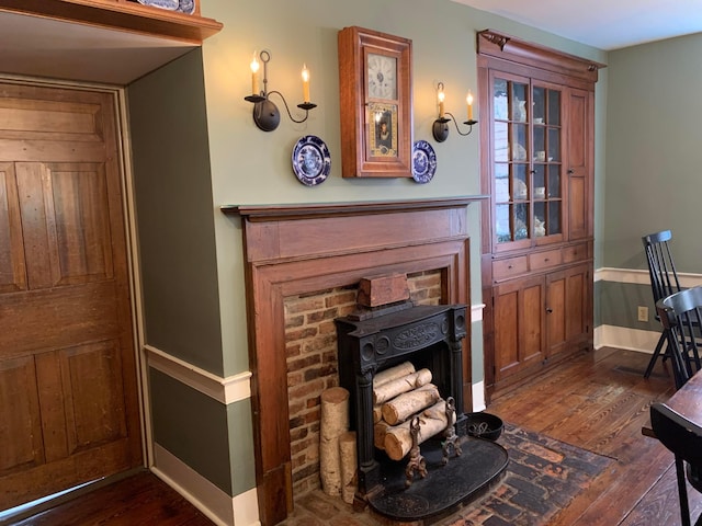 living room with dark hardwood / wood-style floors