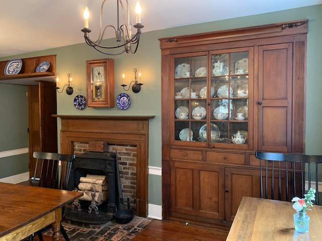 interior space featuring dark hardwood / wood-style floors and a chandelier