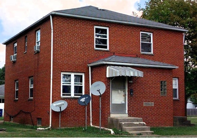 view of front facade with cooling unit