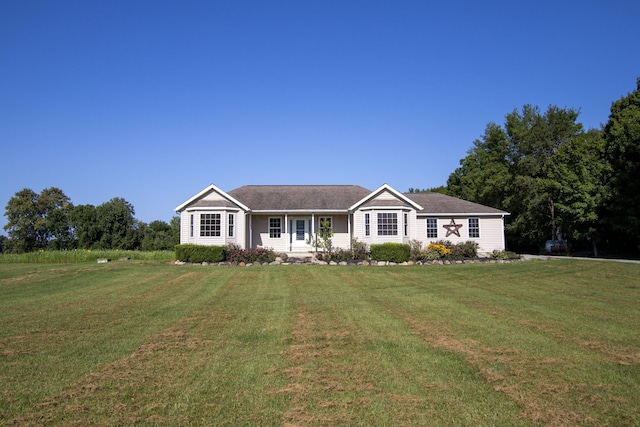 ranch-style home with a front yard