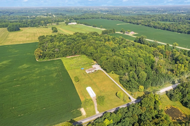 birds eye view of property featuring a rural view