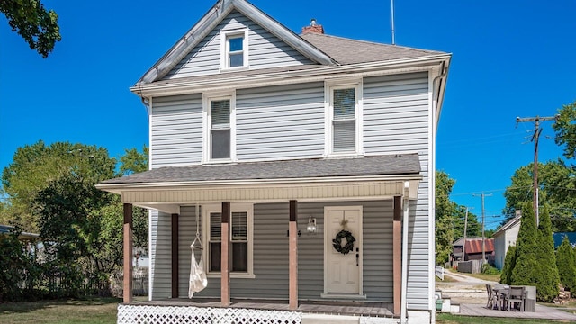 front of property featuring covered porch