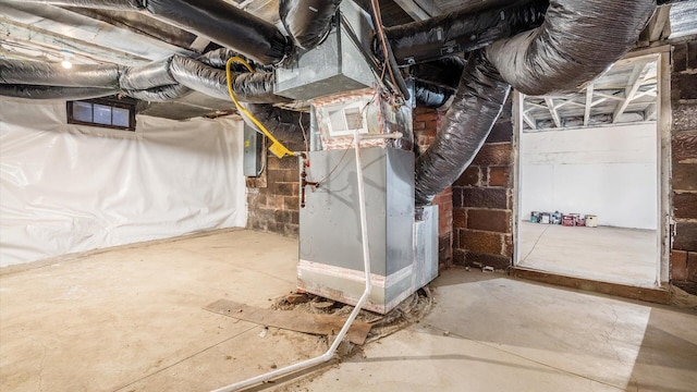 basement featuring heating unit