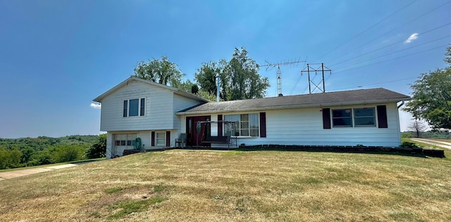 tri-level home featuring a front yard