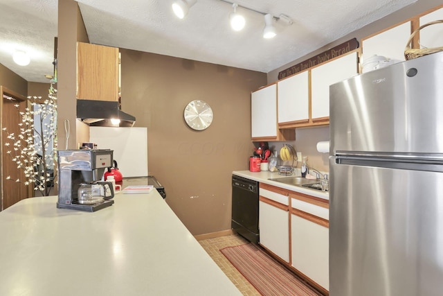 kitchen featuring white cabinets, sink, black dishwasher, and stainless steel refrigerator