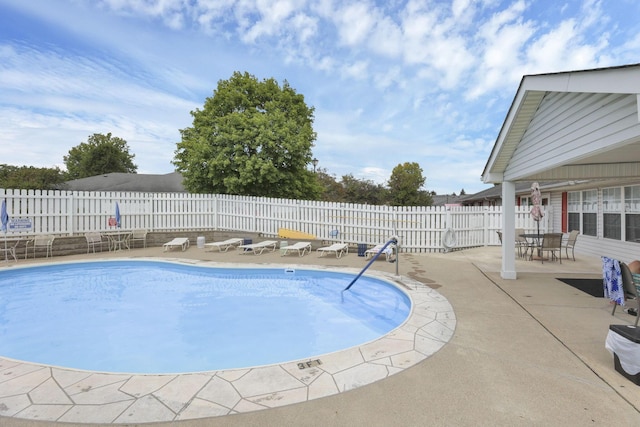 view of pool with a patio area