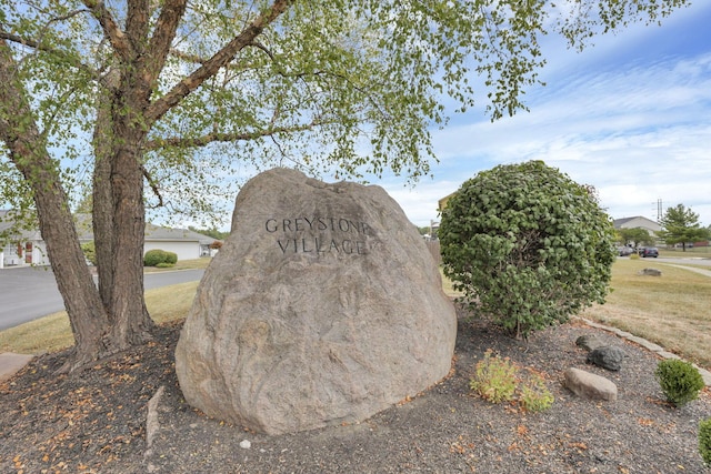 view of community sign