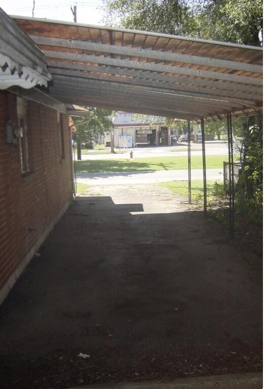 view of car parking with a carport