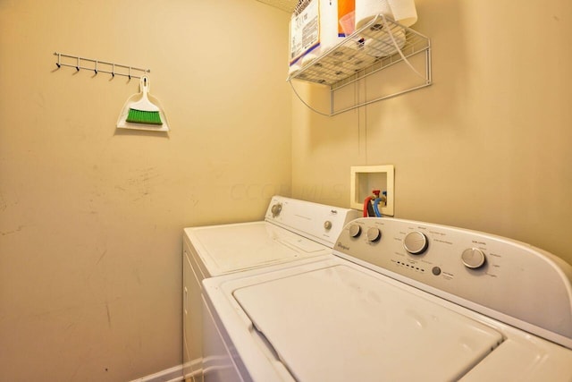 laundry room featuring washing machine and dryer