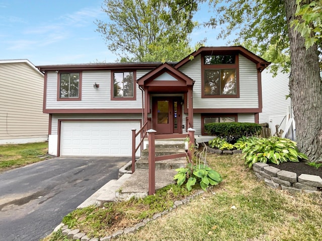 bi-level home featuring a garage