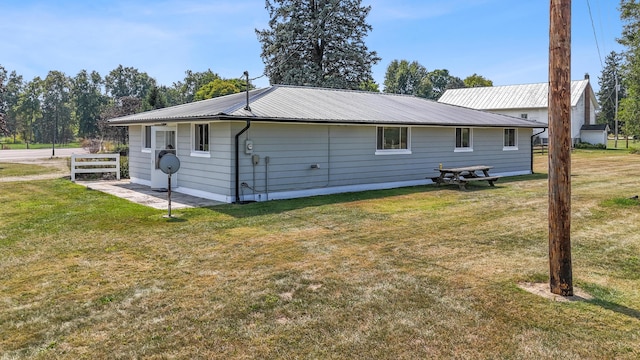 exterior space with a lawn