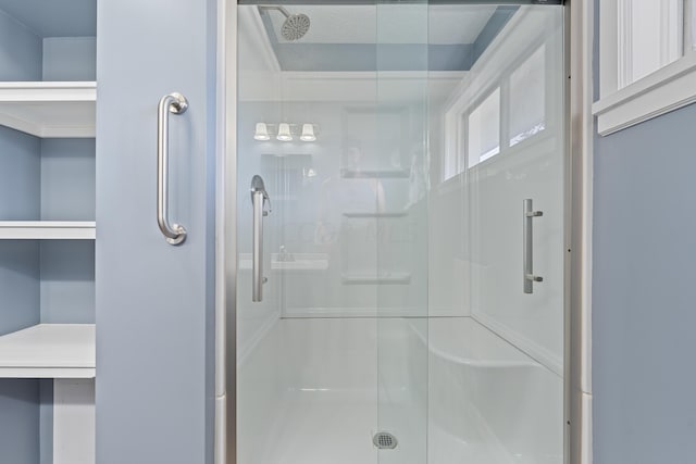 bathroom featuring an enclosed shower