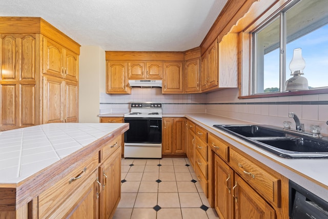 kitchen featuring backsplash, white electric range oven, sink, dishwasher, and light tile patterned flooring