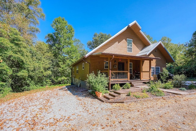 log home with covered porch