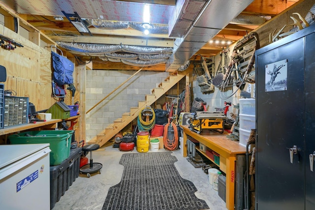 basement with a workshop area