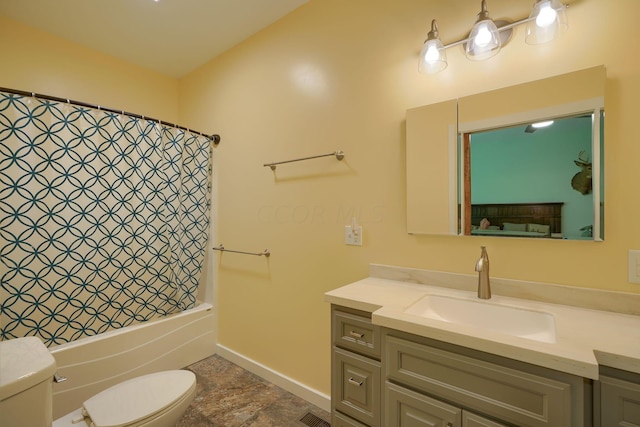 full bathroom with vanity, toilet, and shower / bath combo with shower curtain