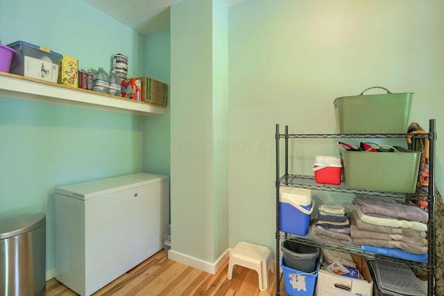 washroom featuring light hardwood / wood-style flooring