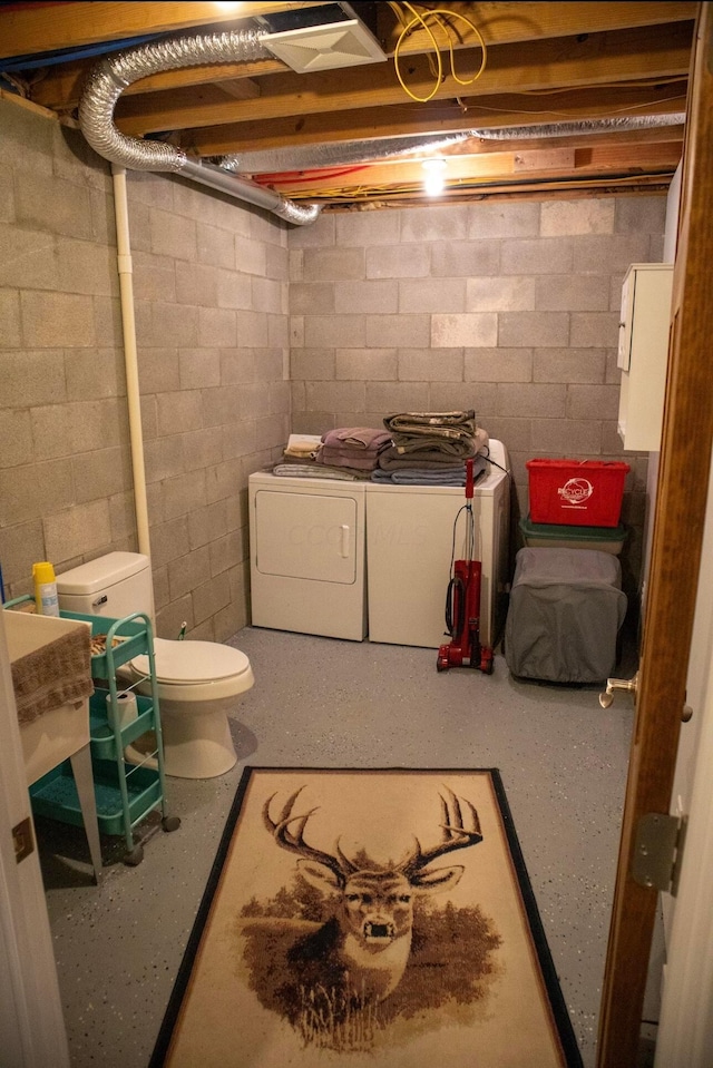 basement featuring separate washer and dryer