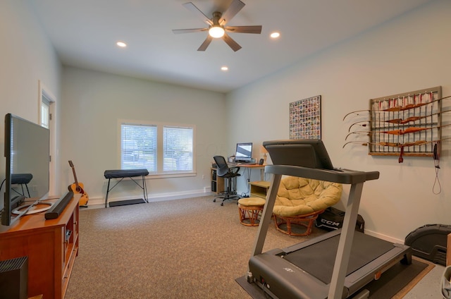 exercise room with carpet flooring and ceiling fan