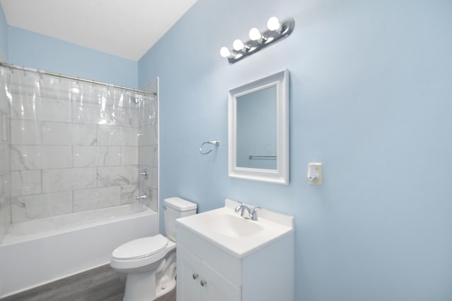 full bathroom featuring vanity, hardwood / wood-style flooring, toilet, and shower / bathtub combination with curtain