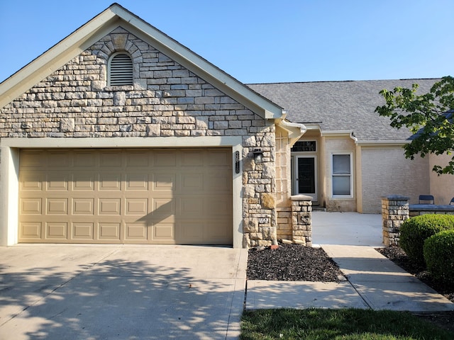 ranch-style home with a garage