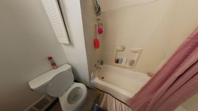 bathroom with toilet and shower / bathtub combination with curtain