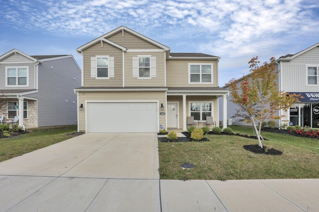 view of front of house featuring a garage and a front lawn