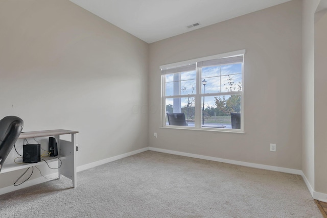 unfurnished office with light colored carpet