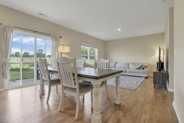 dining room featuring light wood-type flooring