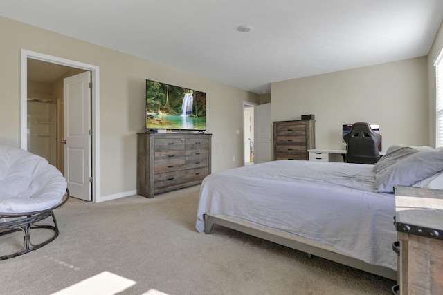 bedroom featuring light carpet