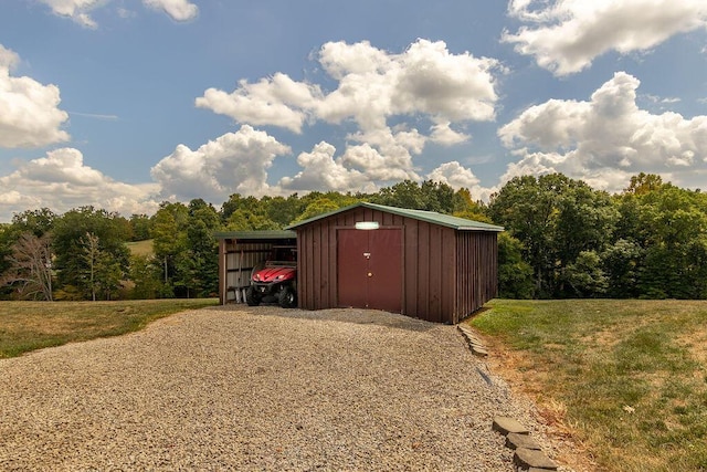 view of outdoor structure with a lawn