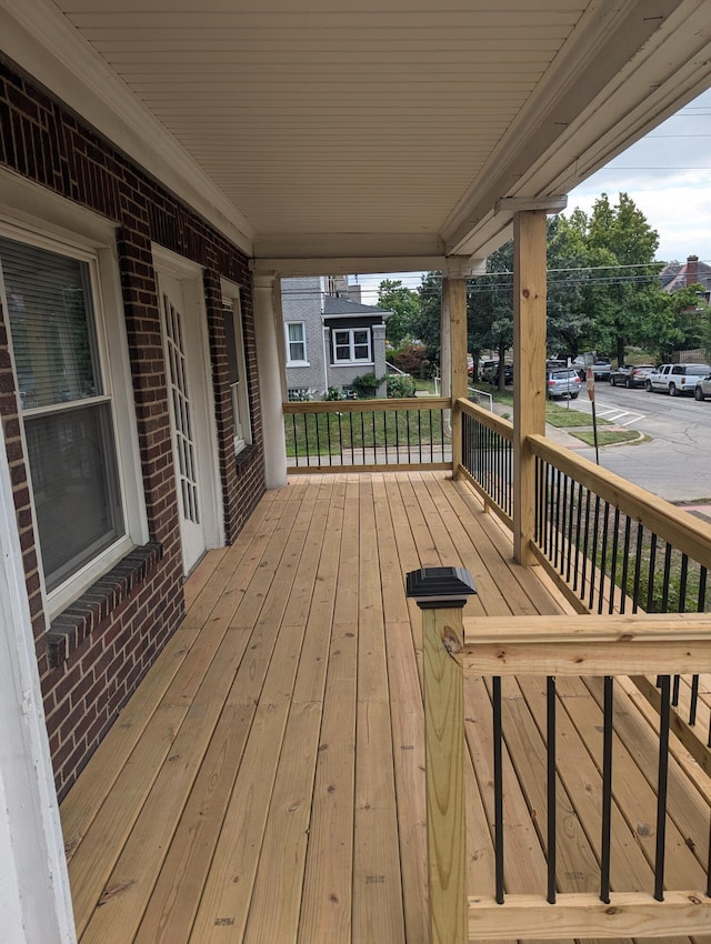 wooden terrace with covered porch