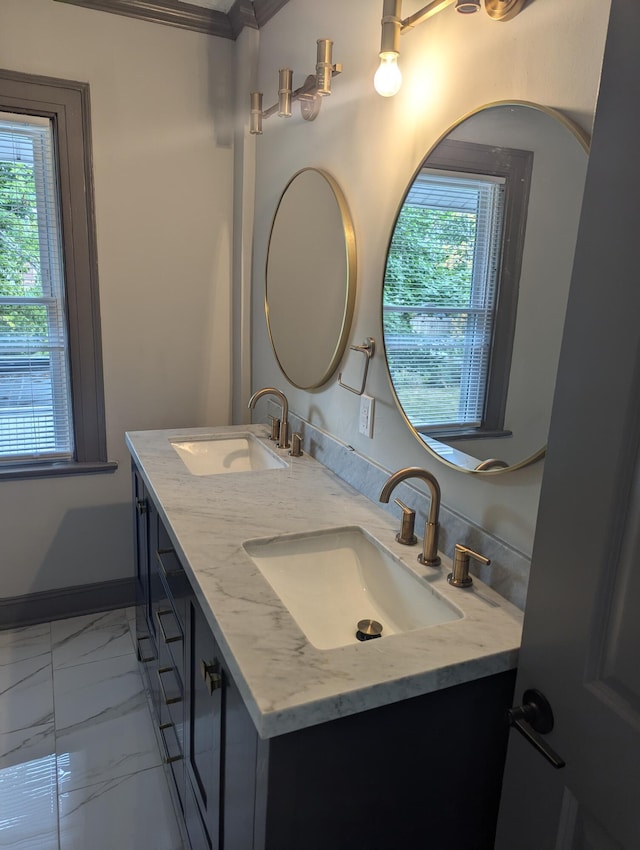 bathroom featuring vanity and crown molding