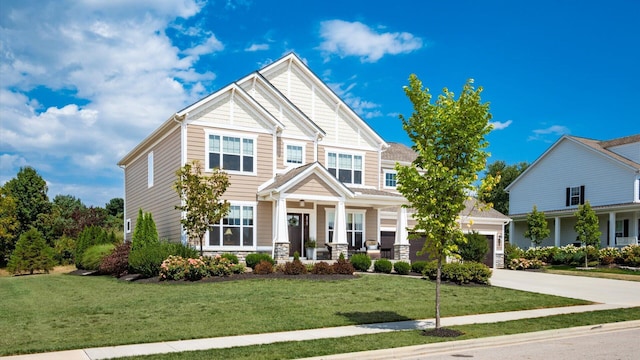 craftsman-style home with a front lawn