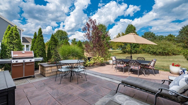 view of patio featuring a grill