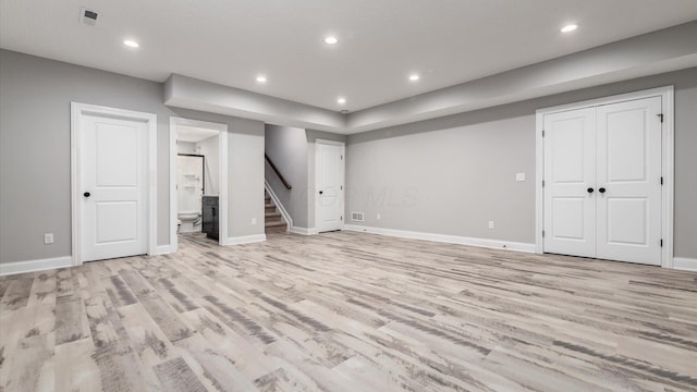 basement with light wood-type flooring