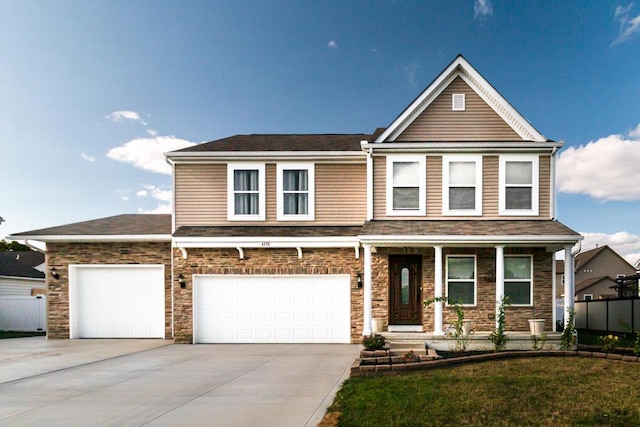 view of front of home featuring a garage and a front lawn