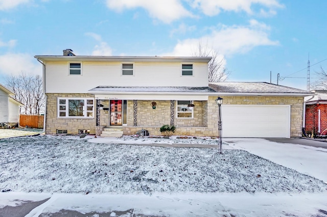 front facade with a garage